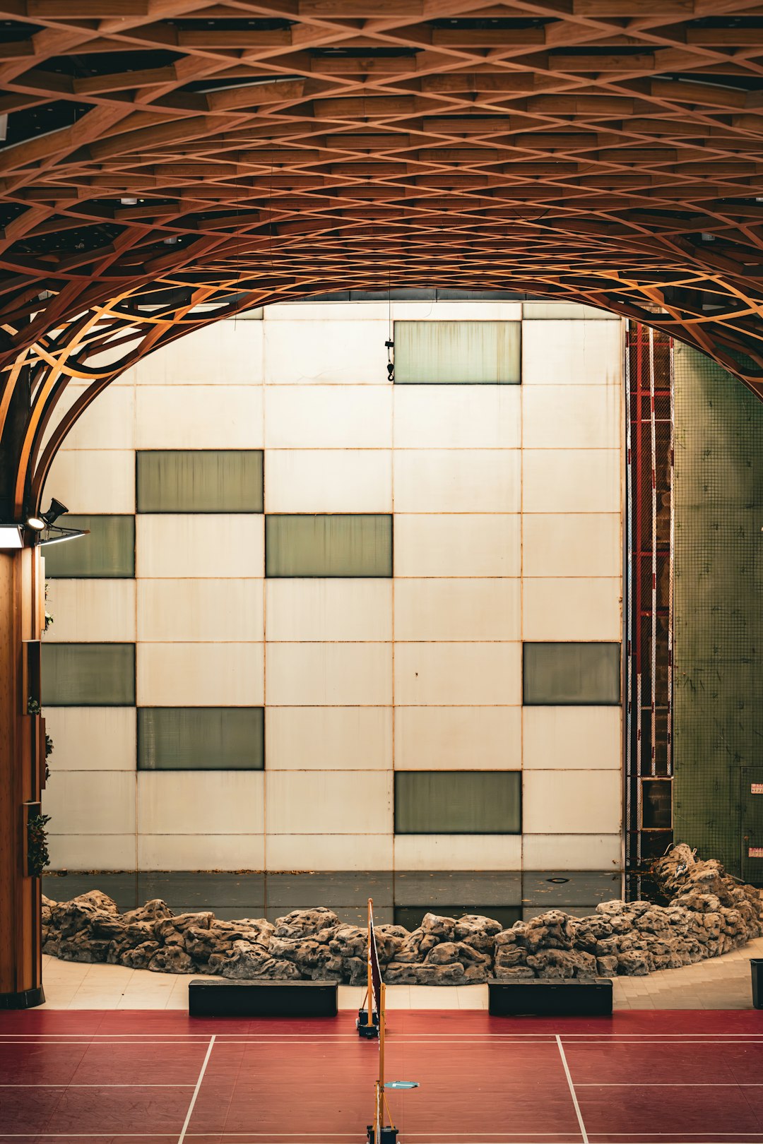 indoor-badminton-court-with-unique-wooden-ceiling-design-bx0oy0pxoqu